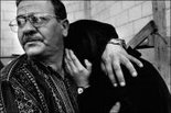 A Palestinian man comforts his wife as she grieves at a funeral in the Jenin refugee camp following the Israeli army's operation to root out suicide bombing cells based in the camp (photo: Judah Passow)